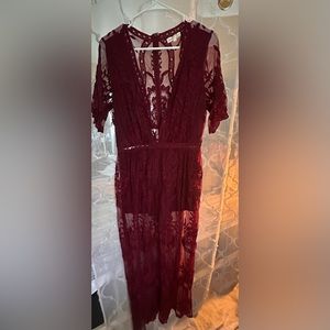 Romper with lace overlay. Shorts underneath.